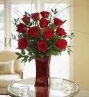 Blooming Love <br>12 Premium Red Roses in Red Vase 