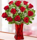 Blooming Love <br>12 Premium Red Roses<br> in Red Vase