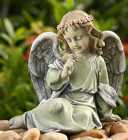 Sitting Angel with Flower Davis Floral Clayton Indiana from Davis Floral